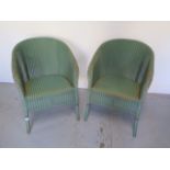 A pair of Lloyd loom chairs in original condition, some wear but reasonably good
