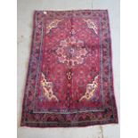 A hand knotted woollen Bijar rug, 1.45m x 1.00m, in good condition