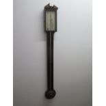 A Georgian mahogany stick barometer, the dial signed G Catteli & Co Hereford, needs some