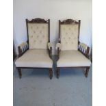 A pair of late Victorian reupholstered button back open armchairs, 103cm tall x 66cm wide x 67cm