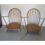 A pair of light elm low seated armchairs, 82cm tall, good condition