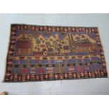 A hand knotted woollen Baluchi rug, 156cm x 90cm