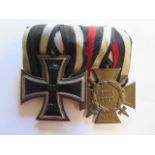 Two WWI 1914-1918 German Cross medals with ribbons
