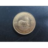 A 1979 fine gold 1oz Krugerrand coin