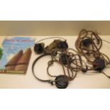 Three pairs of C-LR bakelite headphones and a Battle of Britain Souvenir Brochure 1959