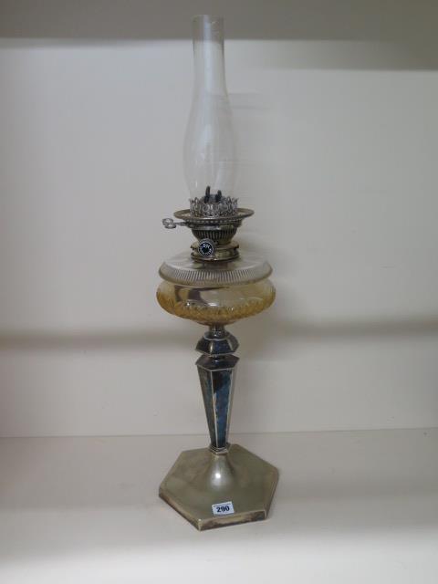 A silver plated oil lamp with glass reservoir and Messangers No2 burner, 71cm tall, some slight wear