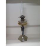 A silver plated oil lamp with glass reservoir and Messangers No2 burner, 71cm tall, some slight wear