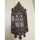 An interesting carved wooden niche door with opening doors, 37cm x 15cm, some small chips and traces