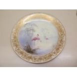 A Royal Worcester Flamingo decorated cabinet plate, 23cm diameter, in good condition