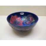 A Moorcroft blue ground bowl, 7cm tall x 16cm diameter, in good condition