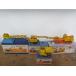 Three boxed Dinky Toys cranes, 20 ton Coles, Goods Yard, Coles Mobile and a boxed Dumper truck