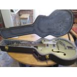 A Gretsch G5420T Electromatic 6 string electric guitar, serial number K518024919, some small usage