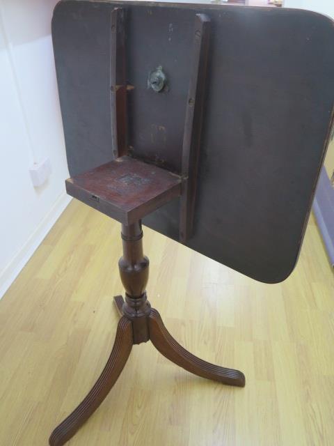 A 19th century mahogany tilt top table on a turned column and splayed tripod base, 70cm tall x - Image 3 of 3