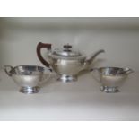 A good silver three piece tea set of classic design in very good condition, no engraving,