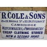 An enamel R.Cole & Sons Watchmakers and Pawnbrokers Cambridge enamel sign, 36cm x 56cm, some small