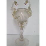 A good Venetian gilt decorated goblet with seahorse applied figures, 25cm tall, appears to be in