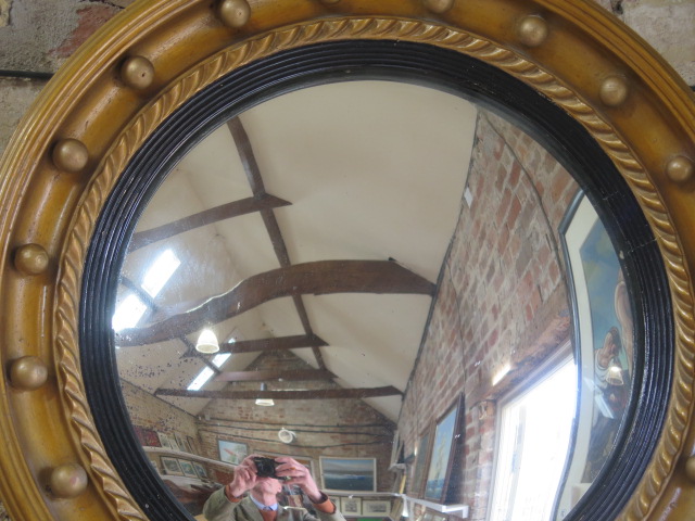 A gilt Bachelor's mirror, 58cm diameter