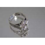 A good 18ct white gold diamond cluster ring, size L, approx 1.85ct total , 1 x round brilliant cut