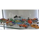 A collection of approximately 40 diecast Dinky and other vehicles, all play worn, but original paint