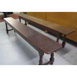 A pair of Victorian oak benches, apparently from a Cambridge Court ,51cm tall x 27cm wide x 213cm