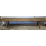 A long rustic bench, 45cm tall x 240cm x 35cm