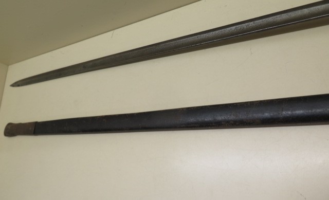 An Officers sword with leather scabbard, blade 83cm long, some wear to grip and scabbard, some - Image 4 of 6