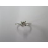 An 18ct hallmarked white gold diamond solitaire ring, 0.40ct clarity I2, colour I, with certificate,