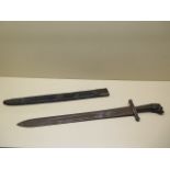 An unmarked 19th century Gladius short sword with lion head pommel and leather scabbard, possibly