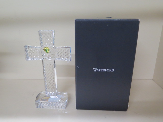 A boxed Waterford lead crystal standing cross, 23cm tall, in good condition
