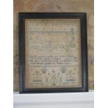 A Victorian pictorial and prose needlework sampler Ann Sharpe aged 10 1851 in an ebonised frame,