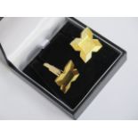 A pair of Garrard & Co hallmarked 9ct gold cufflinks, approx 14.3grams, in good condition, minor