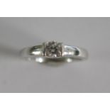 A hallmarked 18ct white gold diamond solitaire ring, approx 0.33ct, size M, approx 3.5 grams,