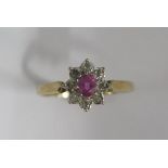 A hallmarked 9ct cluster ring, size N, approx 1.4 grams, generally good