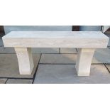 A handmade limestone garden bench with carved detail to front, 47cm tall x 100cm long x 23cm deep