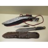 A Kukri in a home made scabbard, blade length 34cm long and a hunting knife, blade 21cm, with