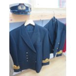 A Lt Commander RNR mess uniform and No:1 dress uniform and a cap