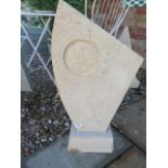 A hand carved abstract garden sculpture made from Clipsham limestone, 75cm tall x 40cm wide