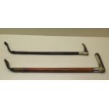 Two riding crops with horn grips, 58 and 57cm long, one with a silver collar