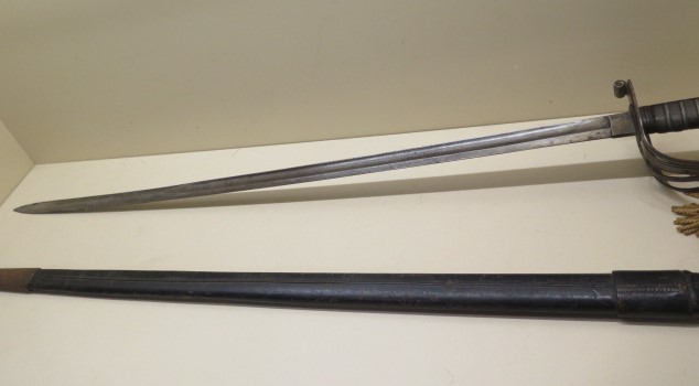 An Officers sword with leather scabbard, blade 83cm long, some wear to grip and scabbard, some - Image 6 of 6