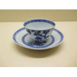 A Nanking Cargo tea bowl and saucer, lot 5577, fault to base of saucer otherwise good