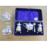 A boxed silver 3 piece cruet set, a silver top bottle and a silver inkwell, weighable silver