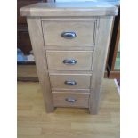 An ex display Canterbury Oak 4 drawer chest retail £260, 100 cm tall x 59cm x 40 cm