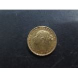 A Victorian bun head gold full sovereign dated 1886