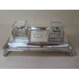 A silver two bottle desk inkwell, London 1896/97, base approx 13.3 troy oz, some general wear but