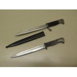 Two German miniature bayonet letter openers, longest 22cm