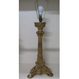 An impressive gilt painted bronze triform column table lamp, 57cm tall, not including light fitting