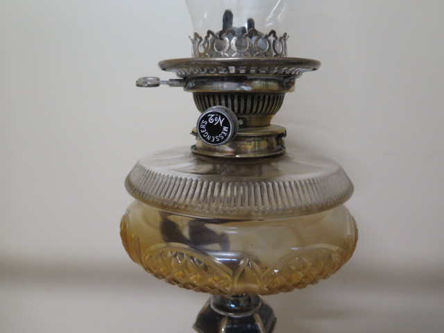 A silver plated oil lamp with glass reservoir and Messangers No2 burner, 71cm tall, some slight wear - Image 2 of 3