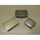 An 800 Italian silver pill box, 8cm wide, a silver vesta and a plated pill box, silver approx 3.3