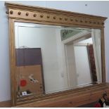 A gilt overmantle mirror with bevel edge glass, 77cm tall x 100cm