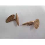 A pair of 9ct gold cufflinks approx 4 grams, some denting